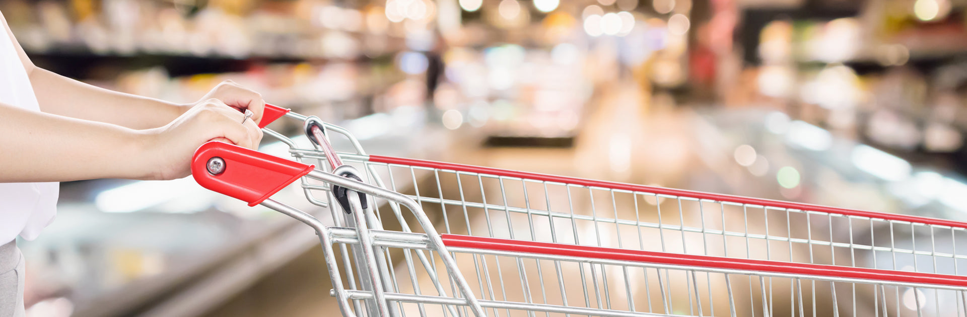 Empty cart in grocery store ready for Brändle shopping