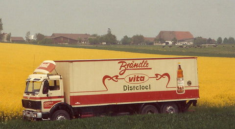 Brändle LKW mit Rapsfeld